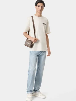 AMIRI Tees<THEATRE FLOCKED TEE Alabaster
