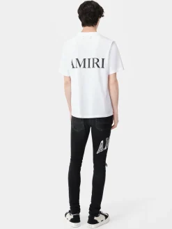 AMIRI Denim<VARSITY LOGO REPAIR JEAN Vintage Black