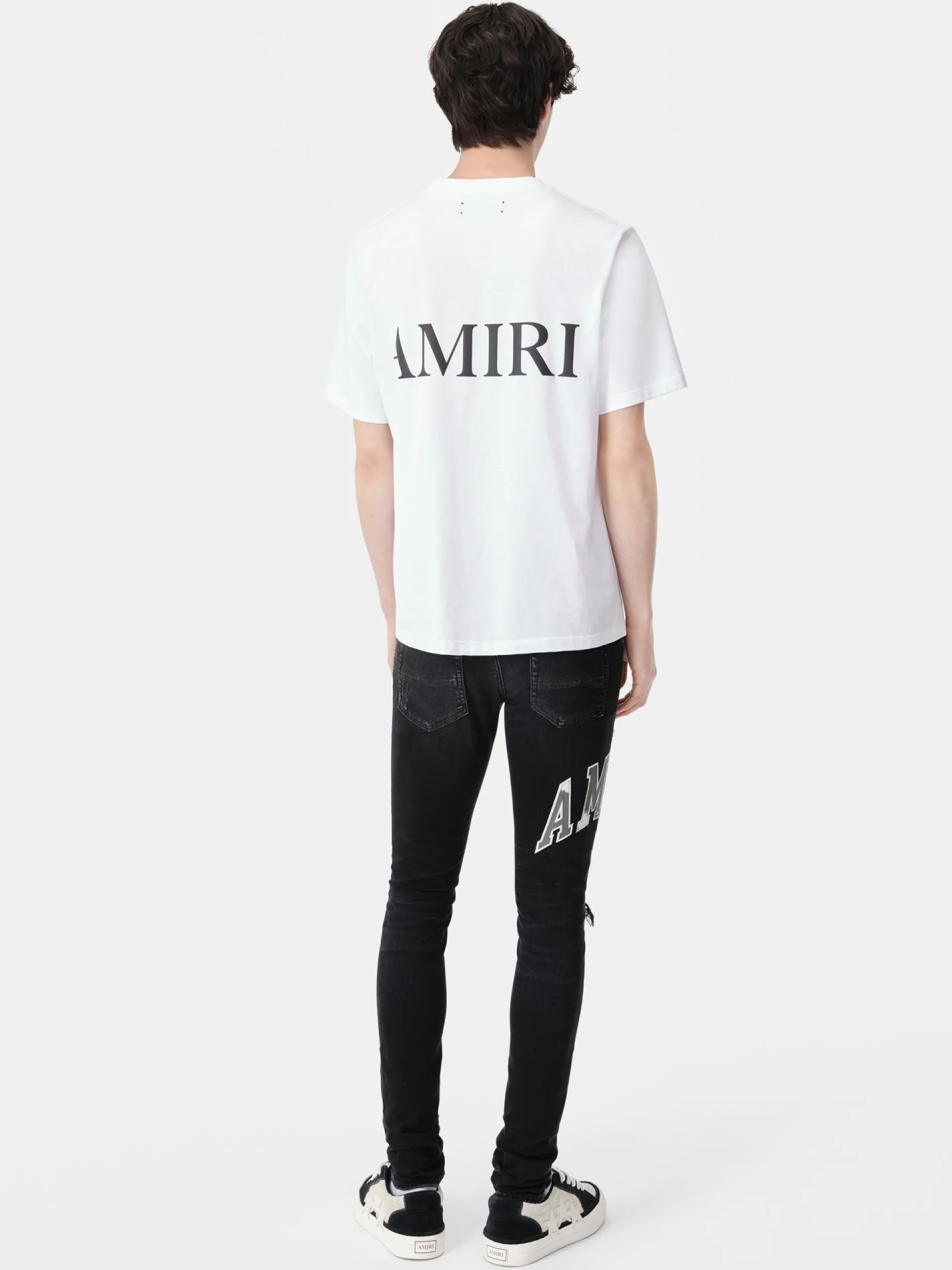 AMIRI Denim<VARSITY LOGO REPAIR JEAN Vintage Black