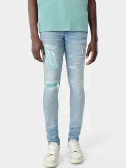 AMIRI Denim<VARSITY LOGO REPAIR JEAN PERFECT INDIGO